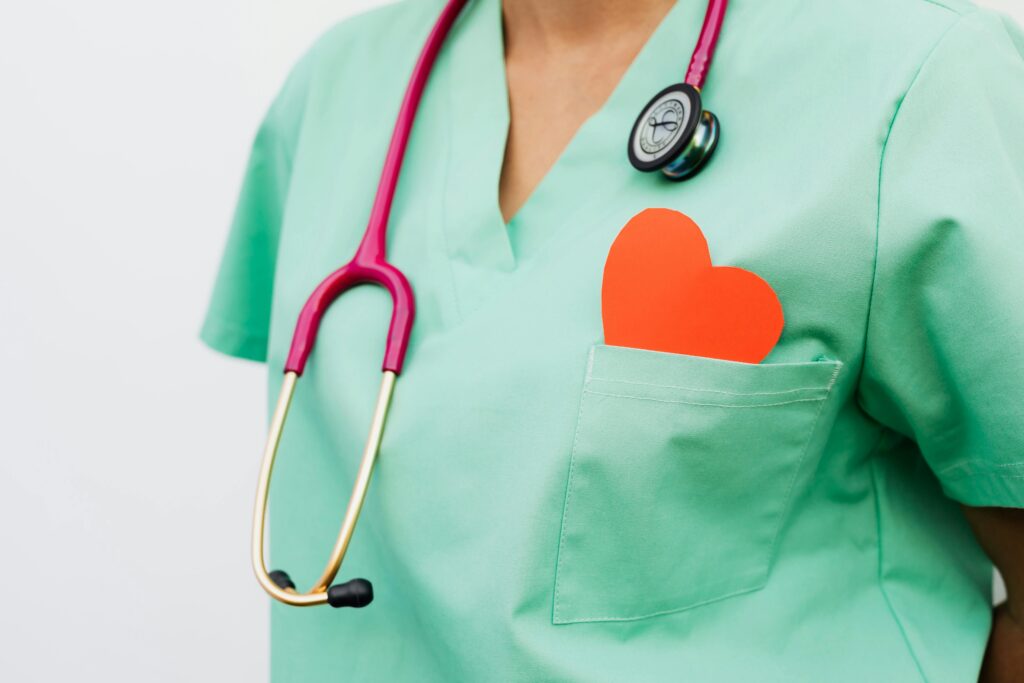 pexels photo 5207102 5207102 A healthcare professional with a stethoscope and red heart symbol emphasizes cardiology care.